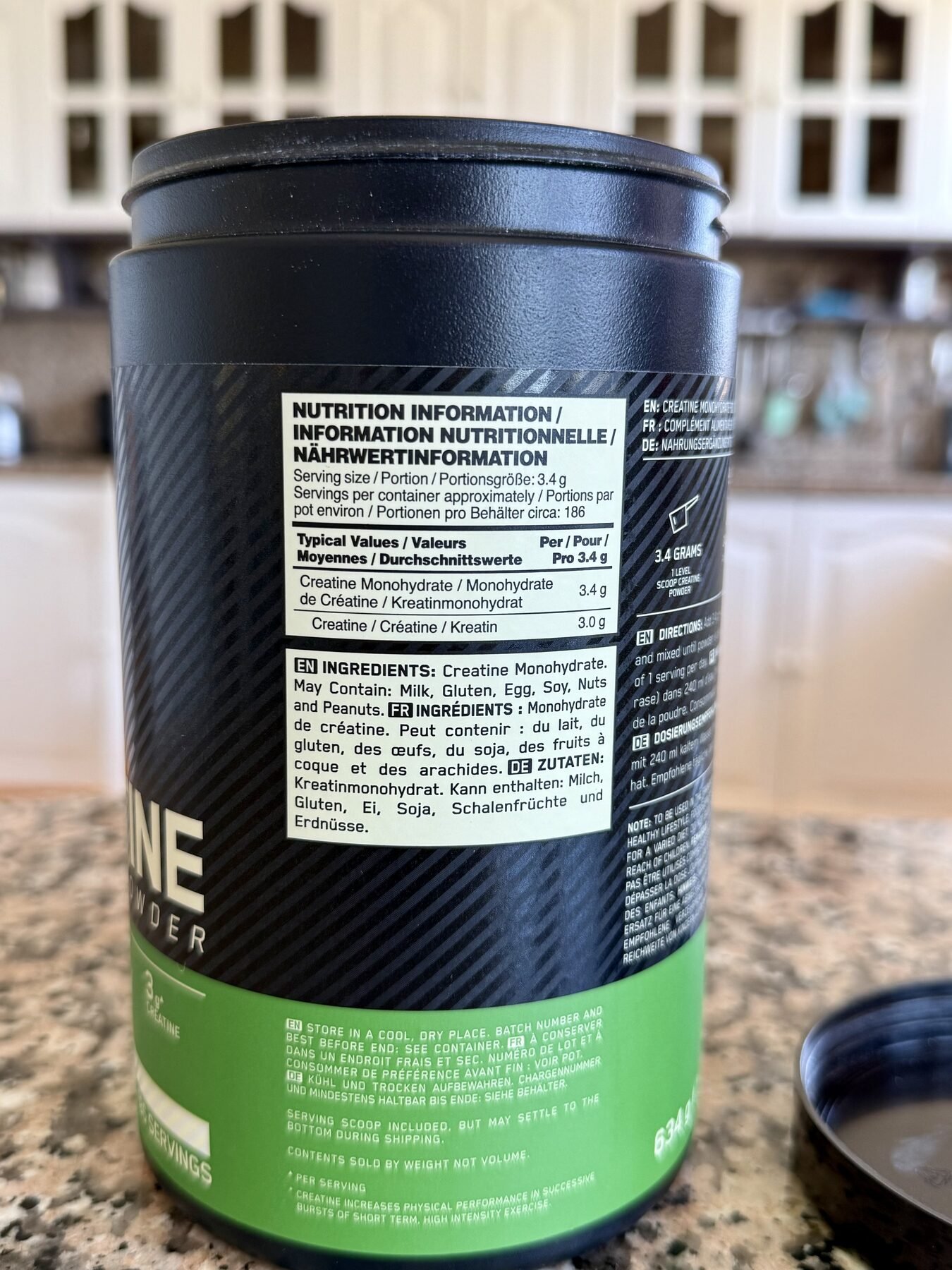Ingredients and nutrition information label on Optimum Nutrition Creatine Monohydrate container.